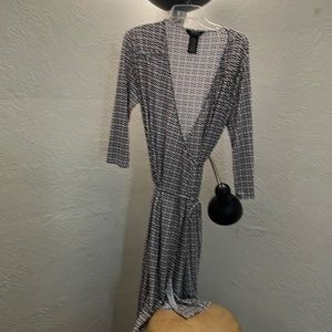 Black, white and red wrap dress.